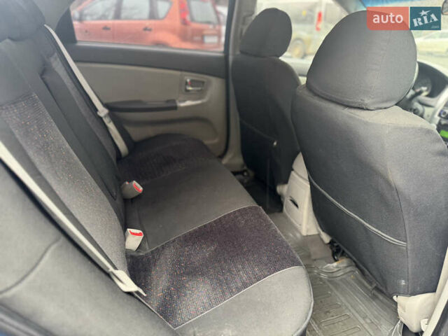 Синий Киа Черато, объемом двигателя 1.59 л и пробегом 258 тыс. км за 3000 $, фото 11 на Automoto.ua