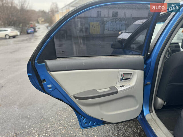 Синий Киа Черато, объемом двигателя 1.59 л и пробегом 258 тыс. км за 3000 $, фото 8 на Automoto.ua