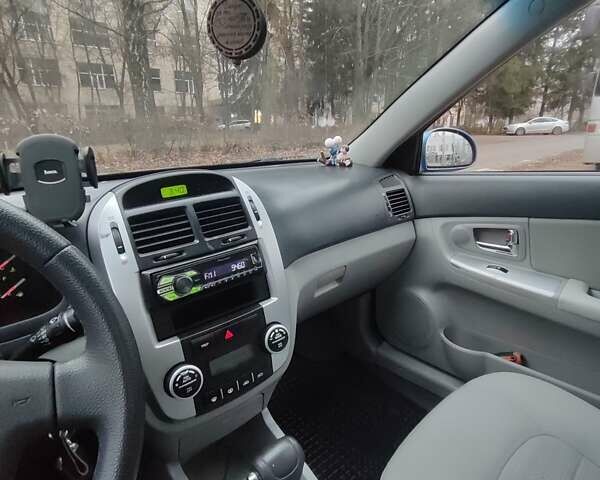Синій Кіа Черато, об'ємом двигуна 1.98 л та пробігом 212 тис. км за 4200 $, фото 13 на Automoto.ua
