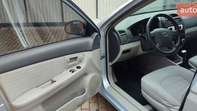 Синий Киа Черато, объемом двигателя 1.59 л и пробегом 161 тыс. км за 4200 $, фото 4 на Automoto.ua