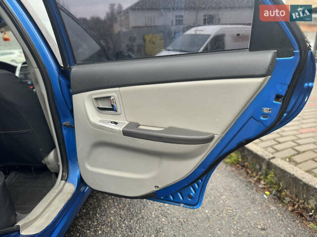 Синий Киа Черато, объемом двигателя 1.59 л и пробегом 258 тыс. км за 3000 $, фото 9 на Automoto.ua