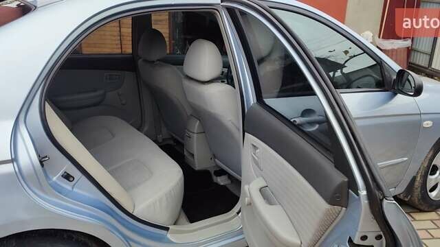 Синий Киа Черато, объемом двигателя 1.59 л и пробегом 161 тыс. км за 4200 $, фото 8 на Automoto.ua