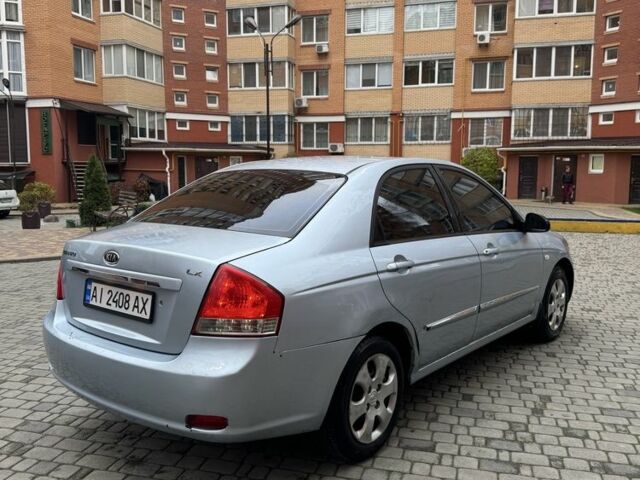 Синий Киа Черато, объемом двигателя 1.6 л и пробегом 280 тыс. км за 2750 $, фото 3 на Automoto.ua