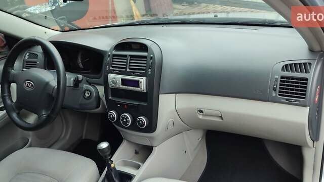 Синий Киа Черато, объемом двигателя 1.59 л и пробегом 161 тыс. км за 4200 $, фото 9 на Automoto.ua