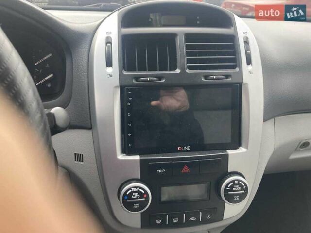 Синій Кіа Черато, об'ємом двигуна 1.98 л та пробігом 250 тис. км за 5700 $, фото 3 на Automoto.ua