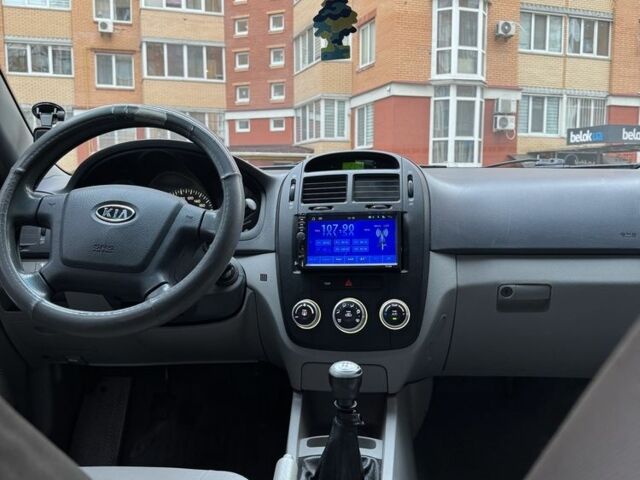 Синий Киа Черато, объемом двигателя 1.6 л и пробегом 280 тыс. км за 2750 $, фото 7 на Automoto.ua