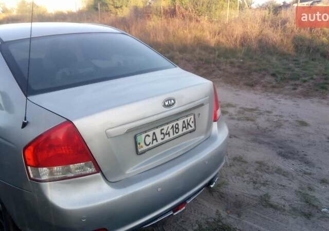 Синий Киа Черато, объемом двигателя 1.6 л и пробегом 250 тыс. км за 4500 $, фото 6 на Automoto.ua