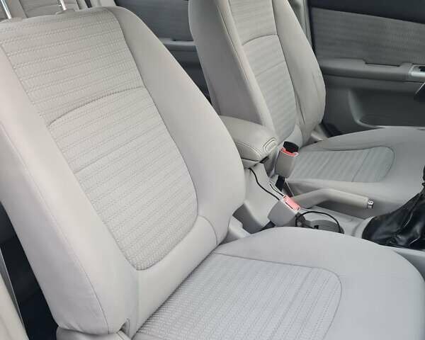 Синій Кіа Черато, об'ємом двигуна 1.6 л та пробігом 313 тис. км за 4600 $, фото 14 на Automoto.ua