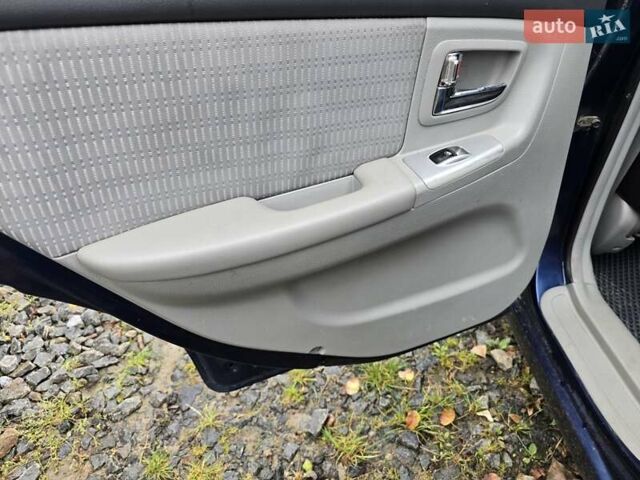 Синій Кіа Черато, об'ємом двигуна 1.98 л та пробігом 300 тис. км за 3900 $, фото 6 на Automoto.ua