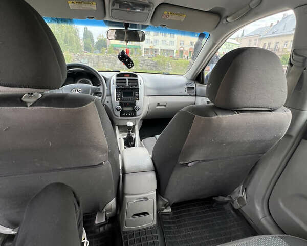 Синій Кіа Черато, об'ємом двигуна 1.6 л та пробігом 291 тис. км за 3500 $, фото 14 на Automoto.ua