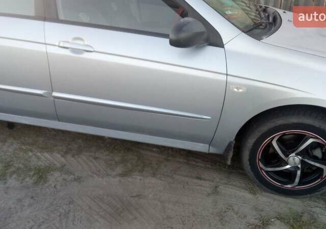 Синий Киа Черато, объемом двигателя 1.6 л и пробегом 250 тыс. км за 4500 $, фото 7 на Automoto.ua