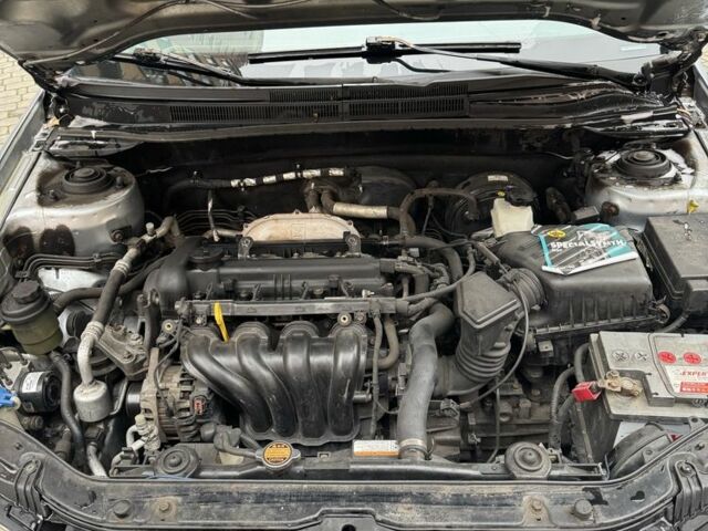 Синий Киа Черато, объемом двигателя 1.6 л и пробегом 280 тыс. км за 2750 $, фото 9 на Automoto.ua