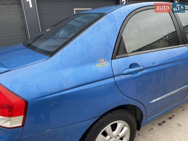 Синий Киа Черато, объемом двигателя 1.59 л и пробегом 200 тыс. км за 2999 $, фото 6 на Automoto.ua