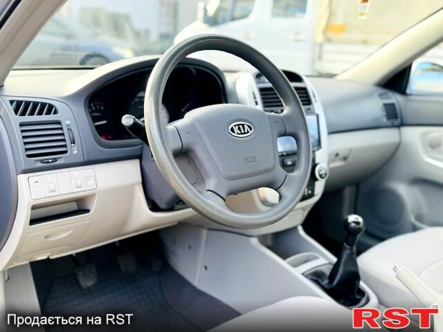 Синий Киа Черато, объемом двигателя 2 л и пробегом 50 тыс. км за 6300 $, фото 10 на Automoto.ua