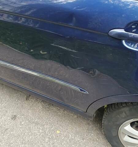 Синий Киа Черато, объемом двигателя 2 л и пробегом 233 тыс. км за 5100 $, фото 13 на Automoto.ua