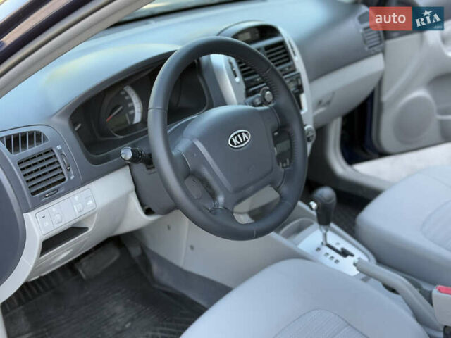 Синий Киа Черато, объемом двигателя 2 л и пробегом 190 тыс. км за 5799 $, фото 8 на Automoto.ua