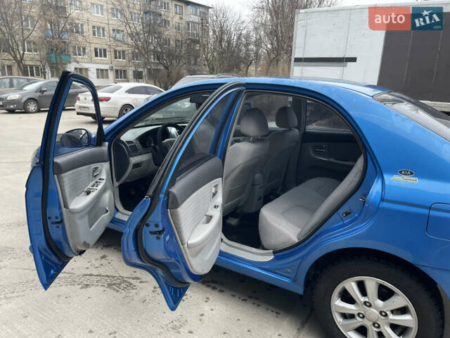 Синий Киа Черато, объемом двигателя 1.59 л и пробегом 200 тыс. км за 2999 $, фото 11 на Automoto.ua