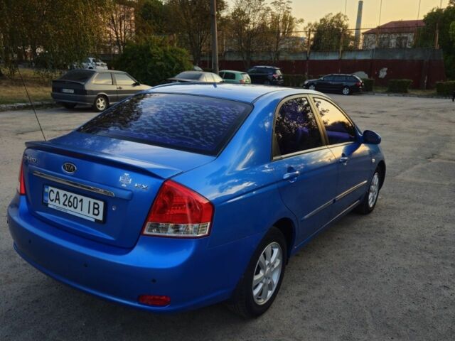 Синий Киа Черато, объемом двигателя 2 л и пробегом 180 тыс. км за 4650 $, фото 5 на Automoto.ua