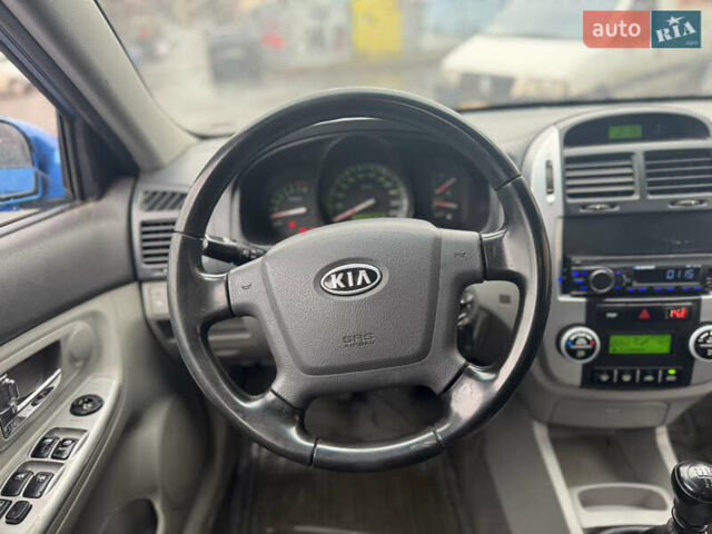 Синий Киа Черато, объемом двигателя 1.59 л и пробегом 258 тыс. км за 3000 $, фото 12 на Automoto.ua