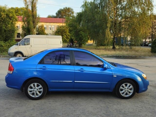 Синий Киа Черато, объемом двигателя 2 л и пробегом 180 тыс. км за 4650 $, фото 4 на Automoto.ua