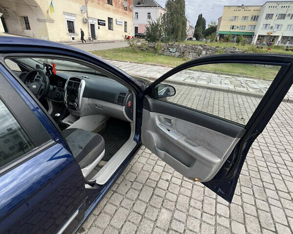 Синій Кіа Черато, об'ємом двигуна 1.6 л та пробігом 291 тис. км за 3500 $, фото 12 на Automoto.ua