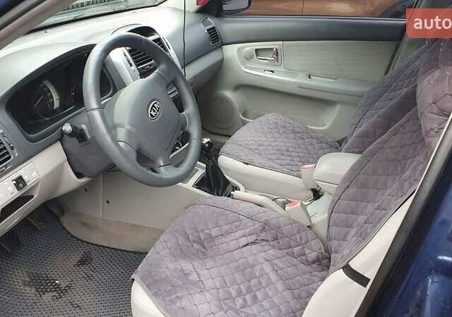 Синий Киа Черато, объемом двигателя 2 л и пробегом 233 тыс. км за 5100 $, фото 5 на Automoto.ua