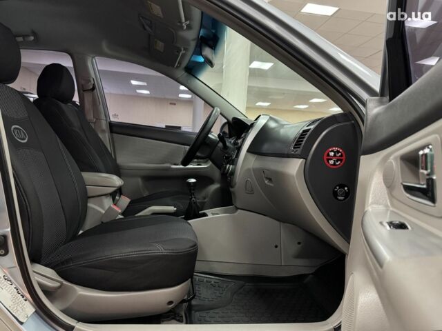 Синий Киа Черато, объемом двигателя 0 л и пробегом 214 тыс. км за 5600 $, фото 7 на Automoto.ua