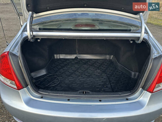 Синий Киа Черато, объемом двигателя 1.6 л и пробегом 192 тыс. км за 4400 $, фото 12 на Automoto.ua