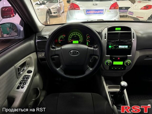 Синій Кіа Черато, об'ємом двигуна 1.6 л та пробігом 214 тис. км за 5600 $, фото 10 на Automoto.ua