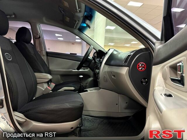 Синій Кіа Черато, об'ємом двигуна 1.6 л та пробігом 214 тис. км за 5600 $, фото 6 на Automoto.ua