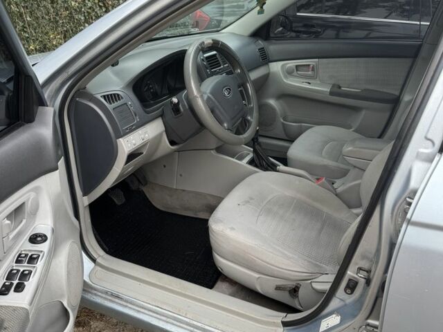 Синий Киа Черато, объемом двигателя 1.6 л и пробегом 280 тыс. км за 2750 $, фото 8 на Automoto.ua