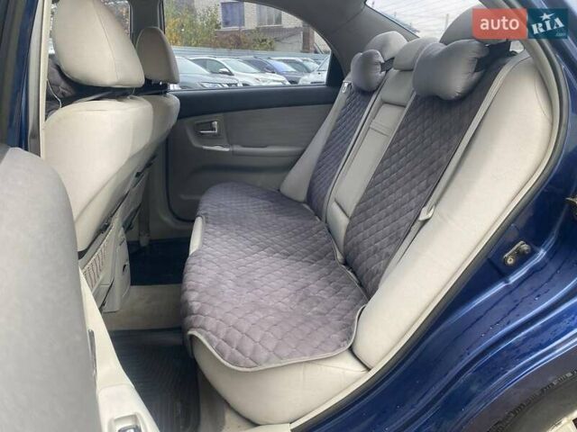 Синій Кіа Черато, об'ємом двигуна 2 л та пробігом 233 тис. км за 4690 $, фото 9 на Automoto.ua