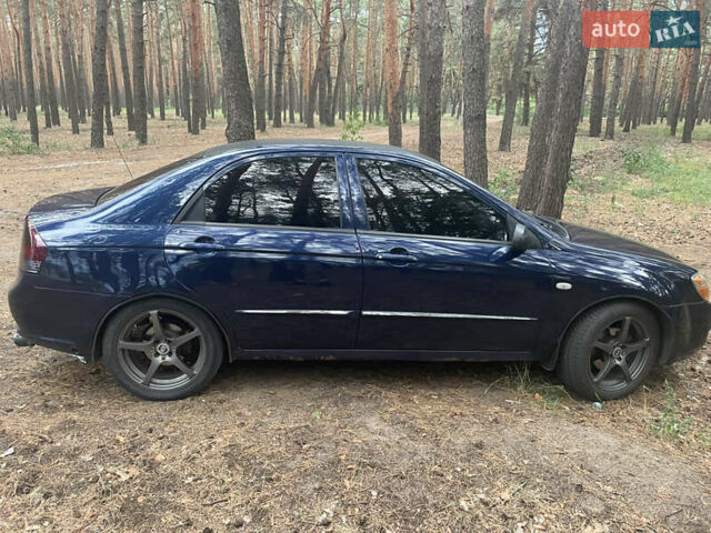 Синий Киа Черато, объемом двигателя 1.59 л и пробегом 288 тыс. км за 4200 $, фото 4 на Automoto.ua