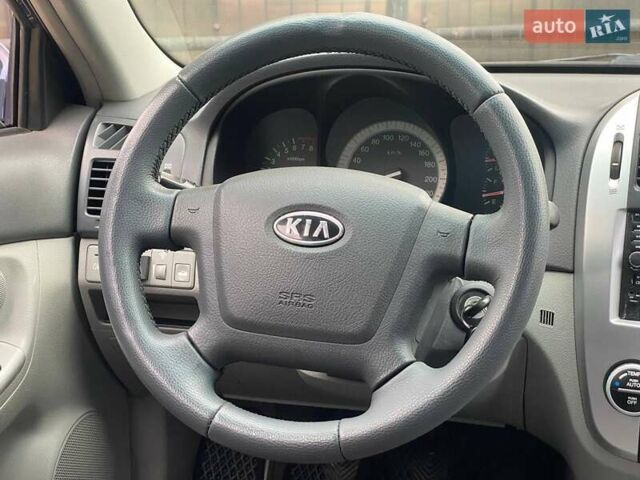 Синій Кіа Черато, об'ємом двигуна 2 л та пробігом 233 тис. км за 4690 $, фото 13 на Automoto.ua