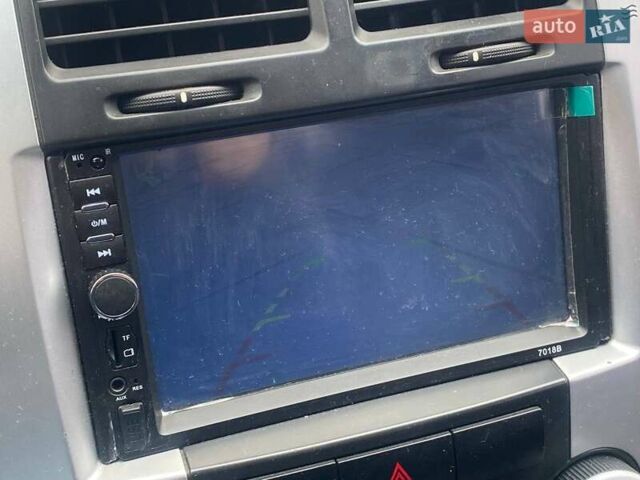 Синій Кіа Черато, об'ємом двигуна 2 л та пробігом 233 тис. км за 4690 $, фото 16 на Automoto.ua