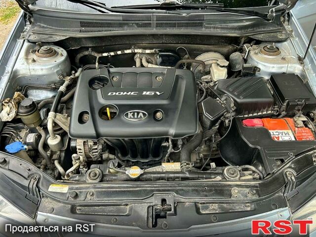 Синій Кіа Черато, об'ємом двигуна 1.6 л та пробігом 182 тис. км за 5000 $, фото 8 на Automoto.ua