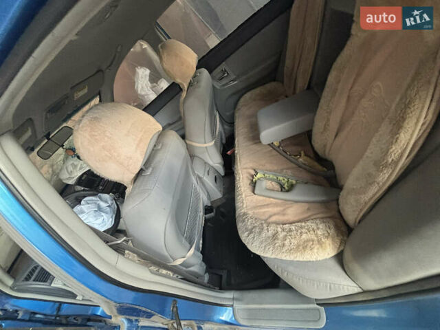 Синий Киа Черато, объемом двигателя 1.6 л и пробегом 140 тыс. км за 1400 $, фото 11 на Automoto.ua