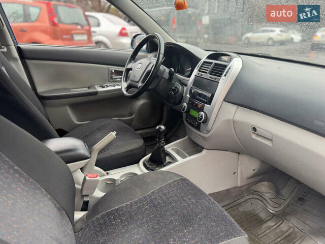 Синий Киа Черато, объемом двигателя 1.59 л и пробегом 258 тыс. км за 3000 $, фото 10 на Automoto.ua