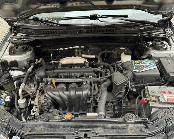 Синий Киа Черато, объемом двигателя 1.6 л и пробегом 280 тыс. км за 2750 $, фото 10 на Automoto.ua