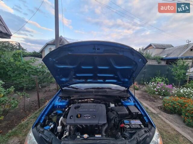 Синій Кіа Черато, об'ємом двигуна 1.6 л та пробігом 313 тис. км за 4600 $, фото 12 на Automoto.ua