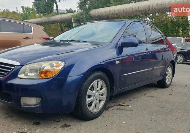 Синій Кіа Черато, об'ємом двигуна 2 л та пробігом 233 тис. км за 3900 $, фото 2 на Automoto.ua