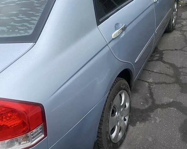 Синий Киа Черато, объемом двигателя 1.6 л и пробегом 160 тыс. км за 5200 $, фото 3 на Automoto.ua