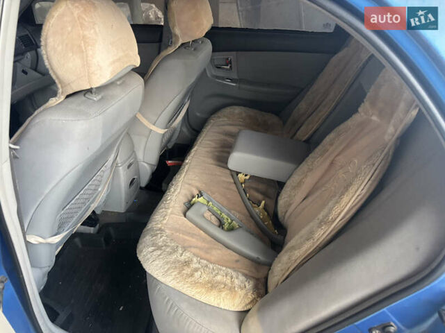 Синий Киа Черато, объемом двигателя 1.6 л и пробегом 140 тыс. км за 1400 $, фото 7 на Automoto.ua