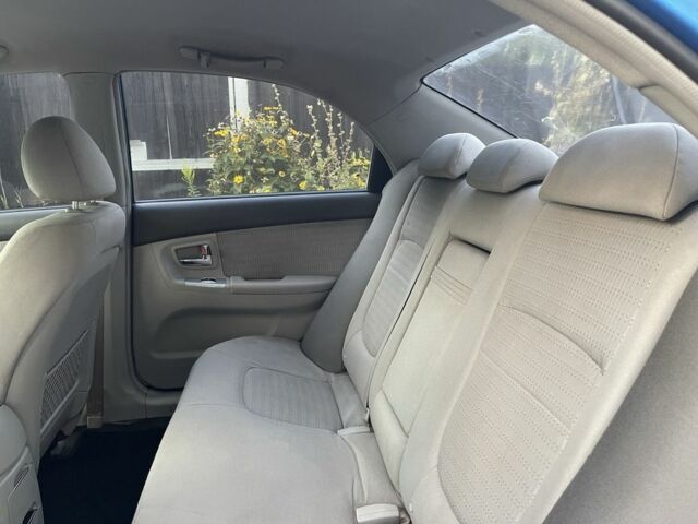 Синий Киа Черато, объемом двигателя 1.6 л и пробегом 22 тыс. км за 3100 $, фото 10 на Automoto.ua