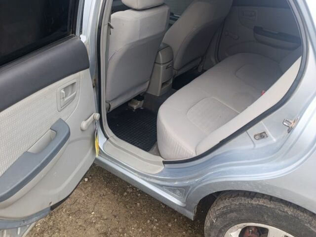 Синій Кіа Черато, об'ємом двигуна 1.6 л та пробігом 206 тис. км за 4000 $, фото 6 на Automoto.ua