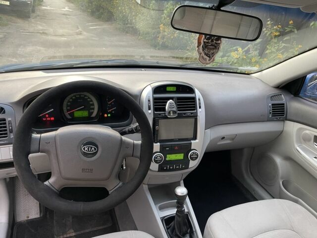 Синий Киа Черато, объемом двигателя 1.6 л и пробегом 22 тыс. км за 3100 $, фото 11 на Automoto.ua