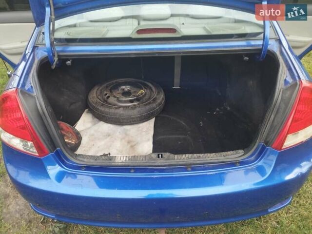 Синий Киа Черато, объемом двигателя 1.6 л и пробегом 297 тыс. км за 3900 $, фото 15 на Automoto.ua