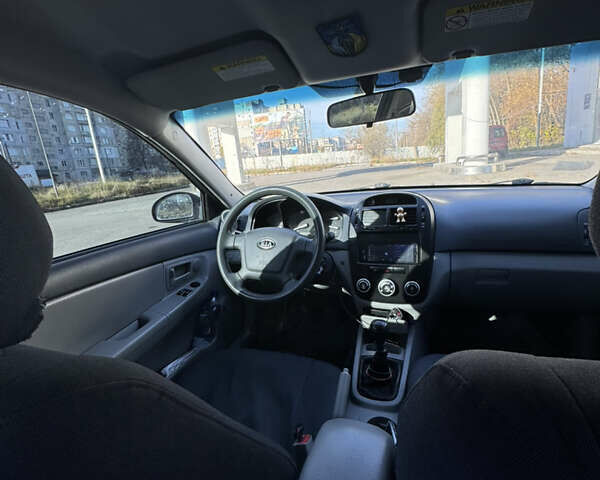 Синий Киа Черато, объемом двигателя 1.59 л и пробегом 250 тыс. км за 3100 $, фото 31 на Automoto.ua
