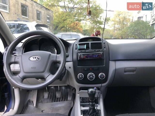 Синий Киа Черато, объемом двигателя 1.6 л и пробегом 292 тыс. км за 4400 $, фото 6 на Automoto.ua