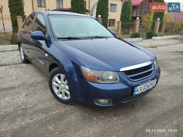 Синий Киа Черато, объемом двигателя 1.98 л и пробегом 246 тыс. км за 4400 $, фото 16 на Automoto.ua